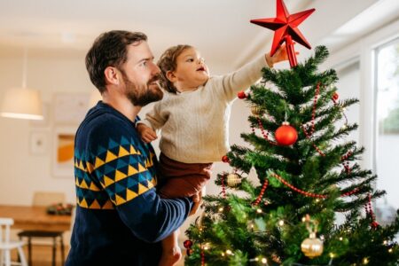 before decorating The Christmas tree is covered with edible decorations such as apples.