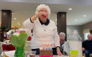 An Ohio woman drinks her favorite beverage to celebrate her 106th birthday.