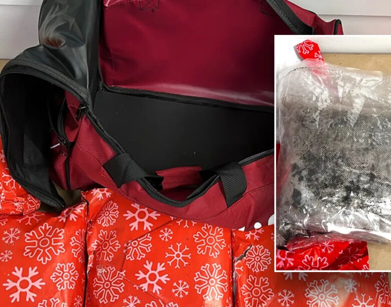 A woman has been arrested for attempting to smuggle 22 pounds of methamphetamine wrapped as a Christmas present into her carry-on bag.